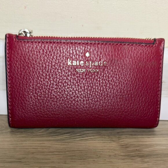 kate spade Handbags - Kate Spade Red Spencer Small Slim Bifold Wallet